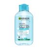 Garnier Micellar Cleansing Water bottle with cotton pad